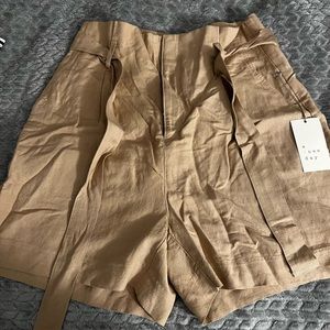 High waisted dress up shorts. Brand new.